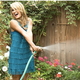 Illustration for article titled Jenn Brown Is Ready For Her Close-Up While Spraying A Garden Hose
